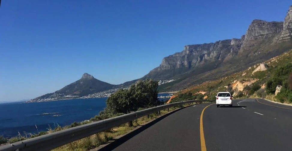 road-trip-south-africa Road in South Africa with a view of the mountains